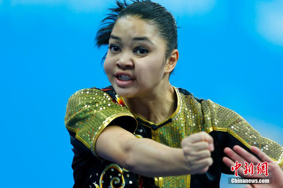 Expresiones faciales de atletas durante los Juegos Asiáticos 2014 en Incheon.