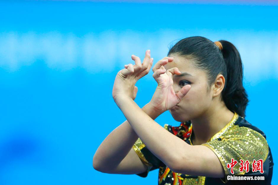 Expresiones faciales de atletas durante los Juegos Asiáticos 2014 en Incheon.