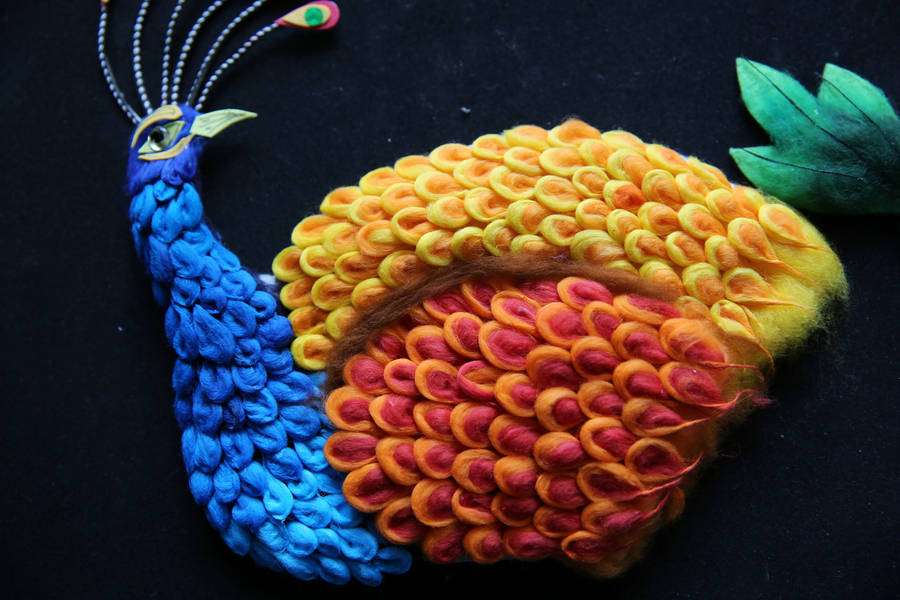 Un pavo real creado por Zhang Baolan. [Foto: VCG]