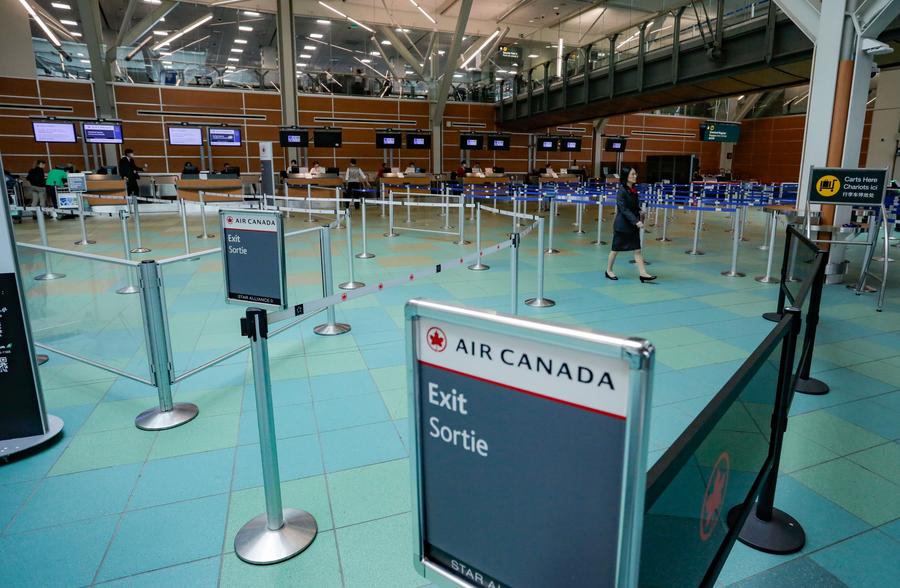 Imagen del 16 de agosto de 2025 de un área de registro de Air Canada vacía vista en el Aeropuerto Internacional de Vancouver, en Richmond, Columbia Británica, Canadá. (Xinhua/Liang Sen)